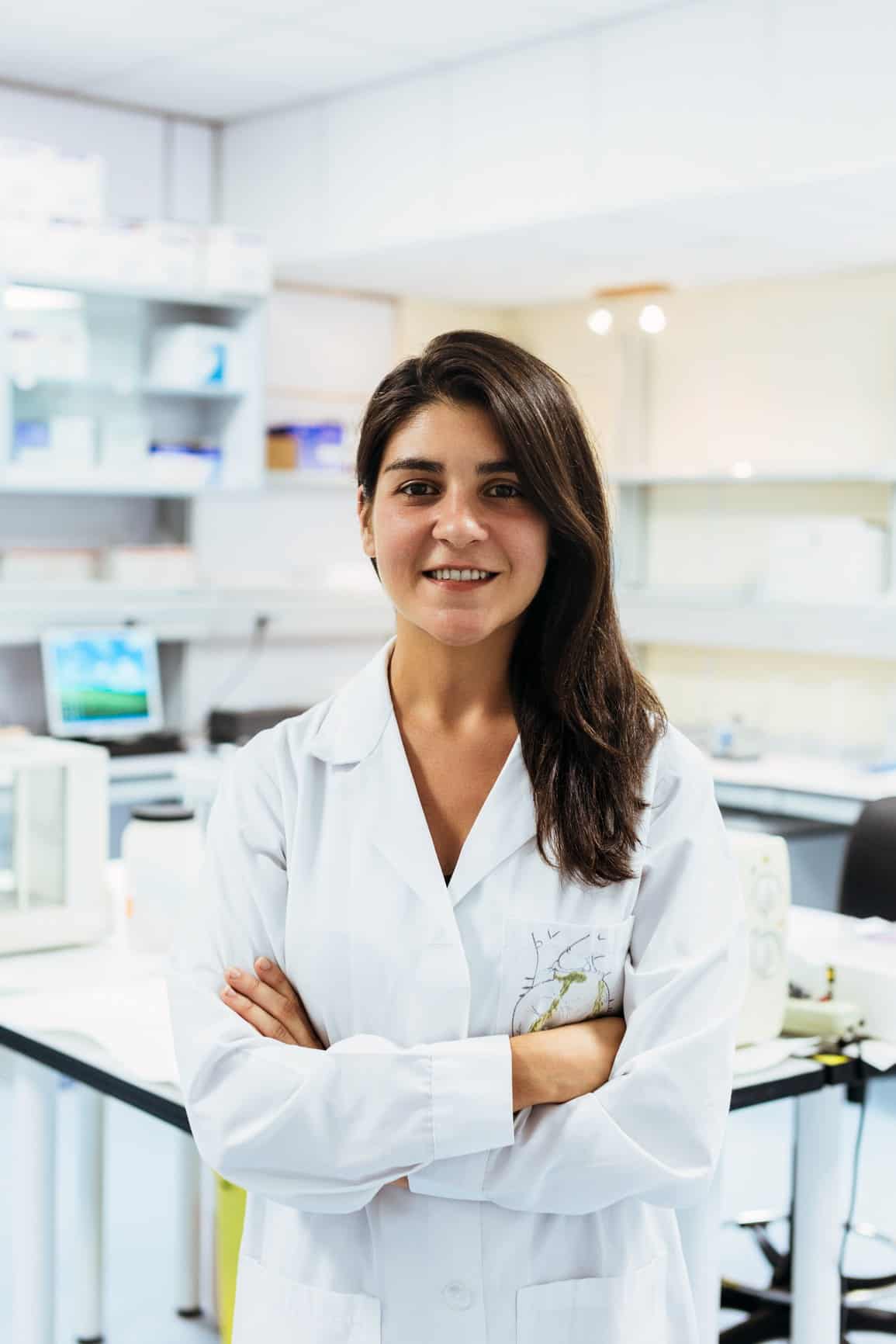 Portrait of a smiling woman in the lab